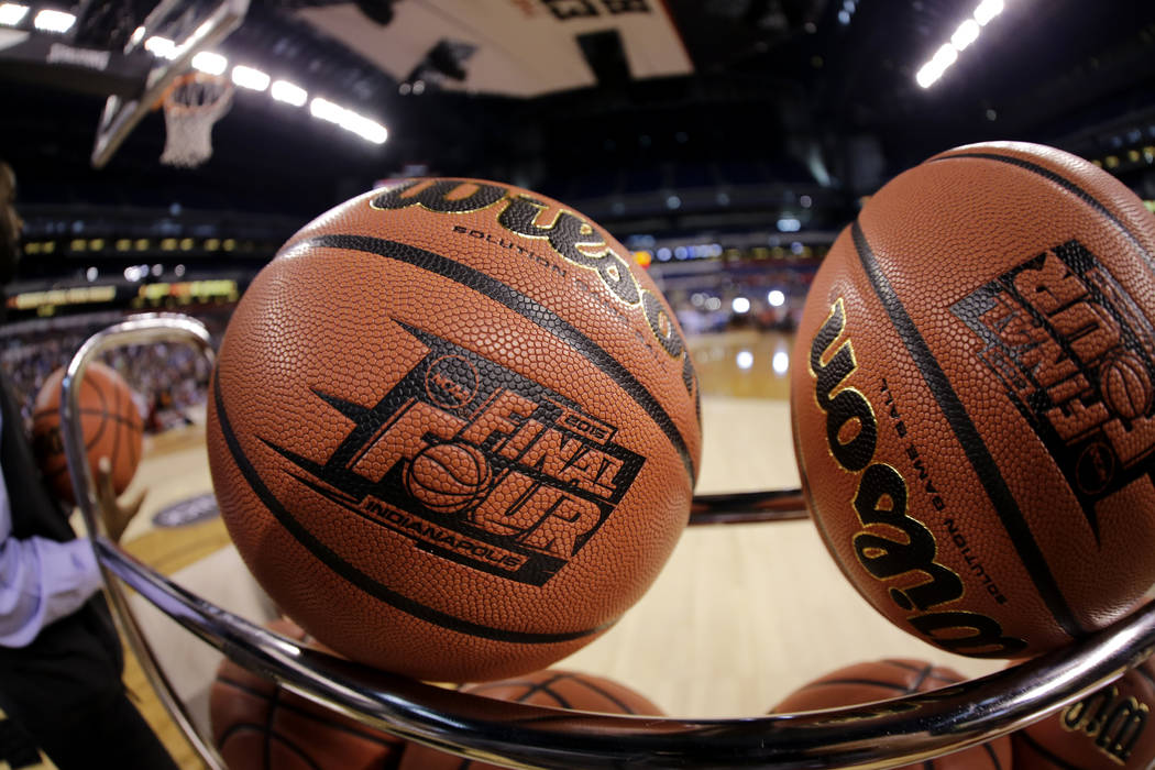 FILE - In this April 3, 2015, file photo, basketballs sit in a rack during Michigan State pract ...