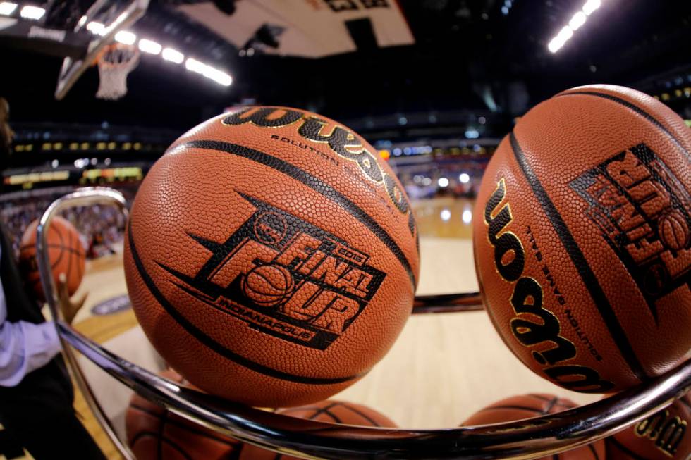FILE - In this April 3, 2015, file photo, basketballs sit in a rack during Michigan State pract ...