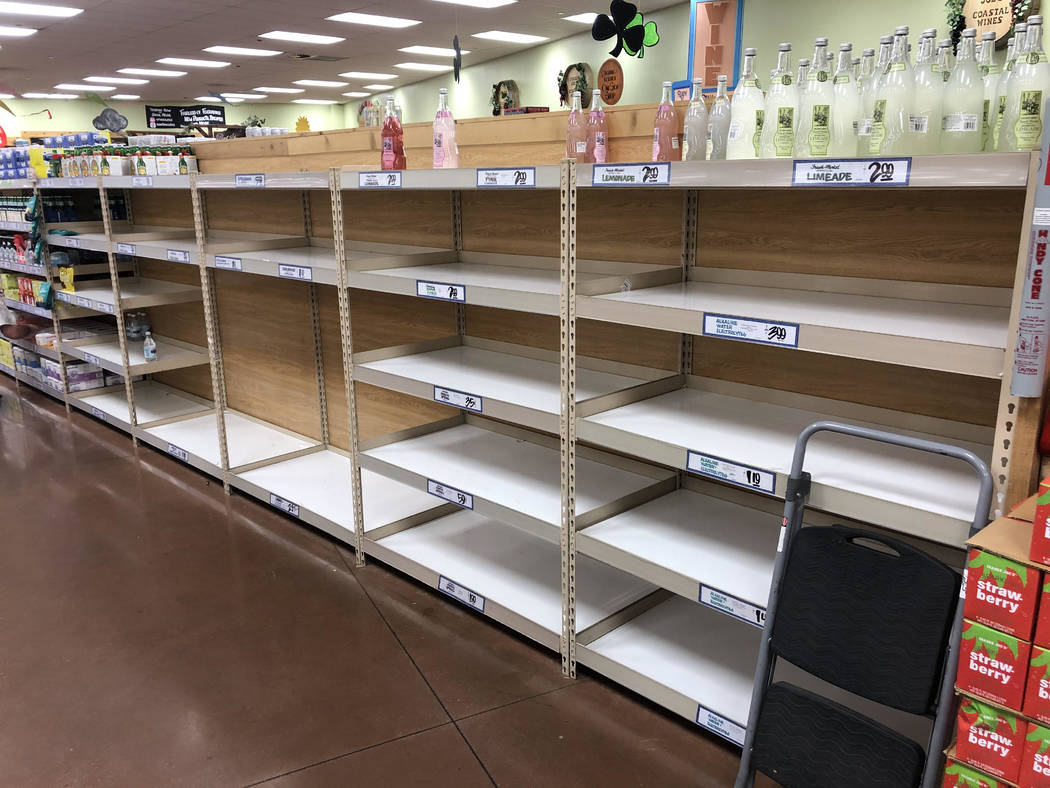 Empty shelves are seen at Trader Joe's in Henderson, Friday, March 13, 2020. (Jason Orts /Las V ...