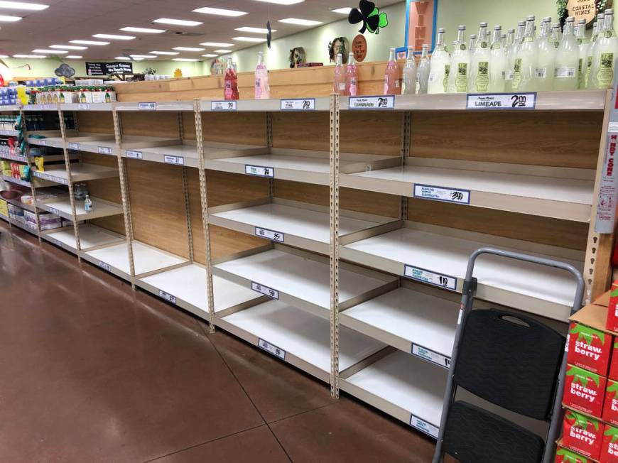Empty shelves are seen at Trader Joe's in Henderson, Friday, March 13, 2020. (Jason Orts /Las V ...