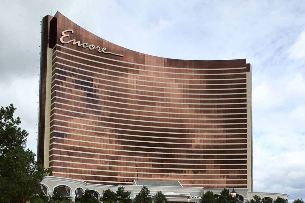 Members of the news media take a tour on the Harbor Walk outside Encore Boston Harbor in Everet ...