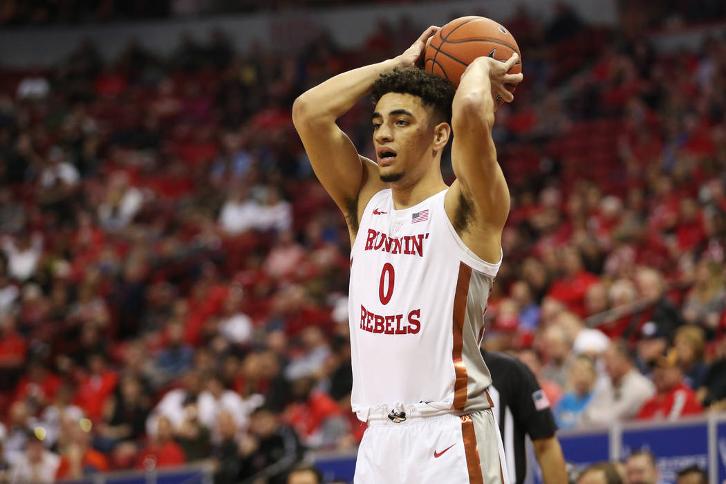 UNLV guard Jay Green looks for an open pass against Boise State Broncos during the first half o ...