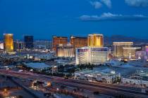 The Las Vegas Strip lights up at dusk as seen from the VooDoo Lounge atop the Rio. (Las Vegas R ...