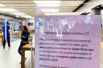 A notice explaining the temporary closure of Apple The Forum Shops due to concerns about the tr ...