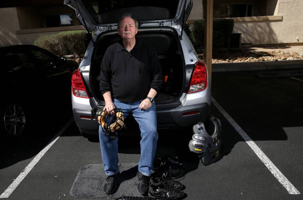 High school umpire Jim Bullock in his "locker room/office" at his Las Vegas home Tues ...