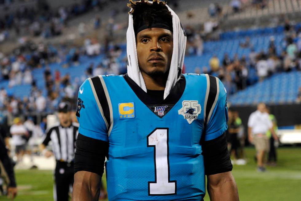 FILE - In this Sept. 13, 2019, file photo, Carolina Panthers quarterback Cam Newton (1) walks o ...