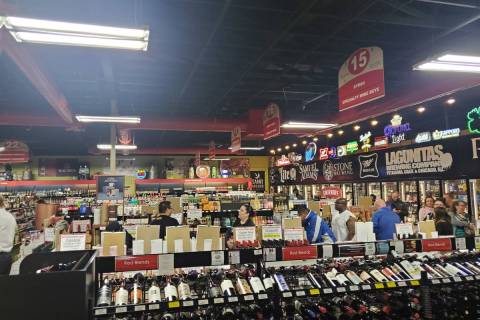 The line to the cashier at a Lee's Discount Liquor Tuesday night. (Adam Hill/Las Vegas Review-J ...