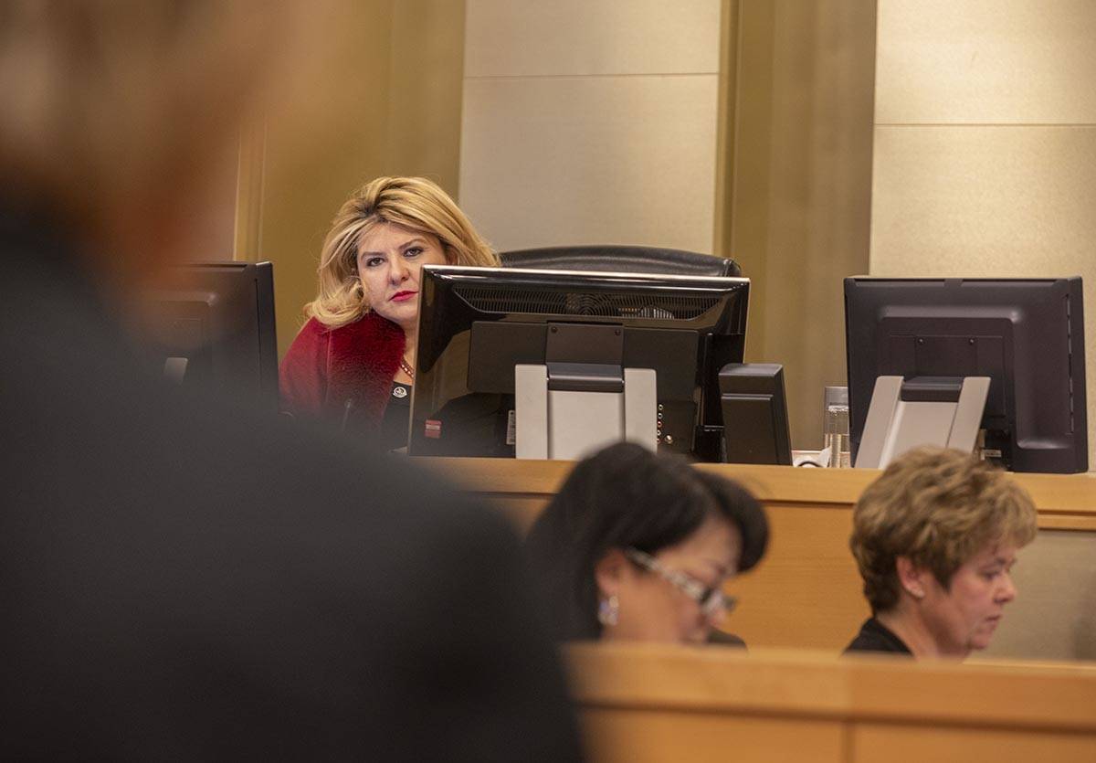 Mayor Pro Tem Michele Fiore listens as Las Vegas Mayor Carolyn Goodman delivers a public statem ...