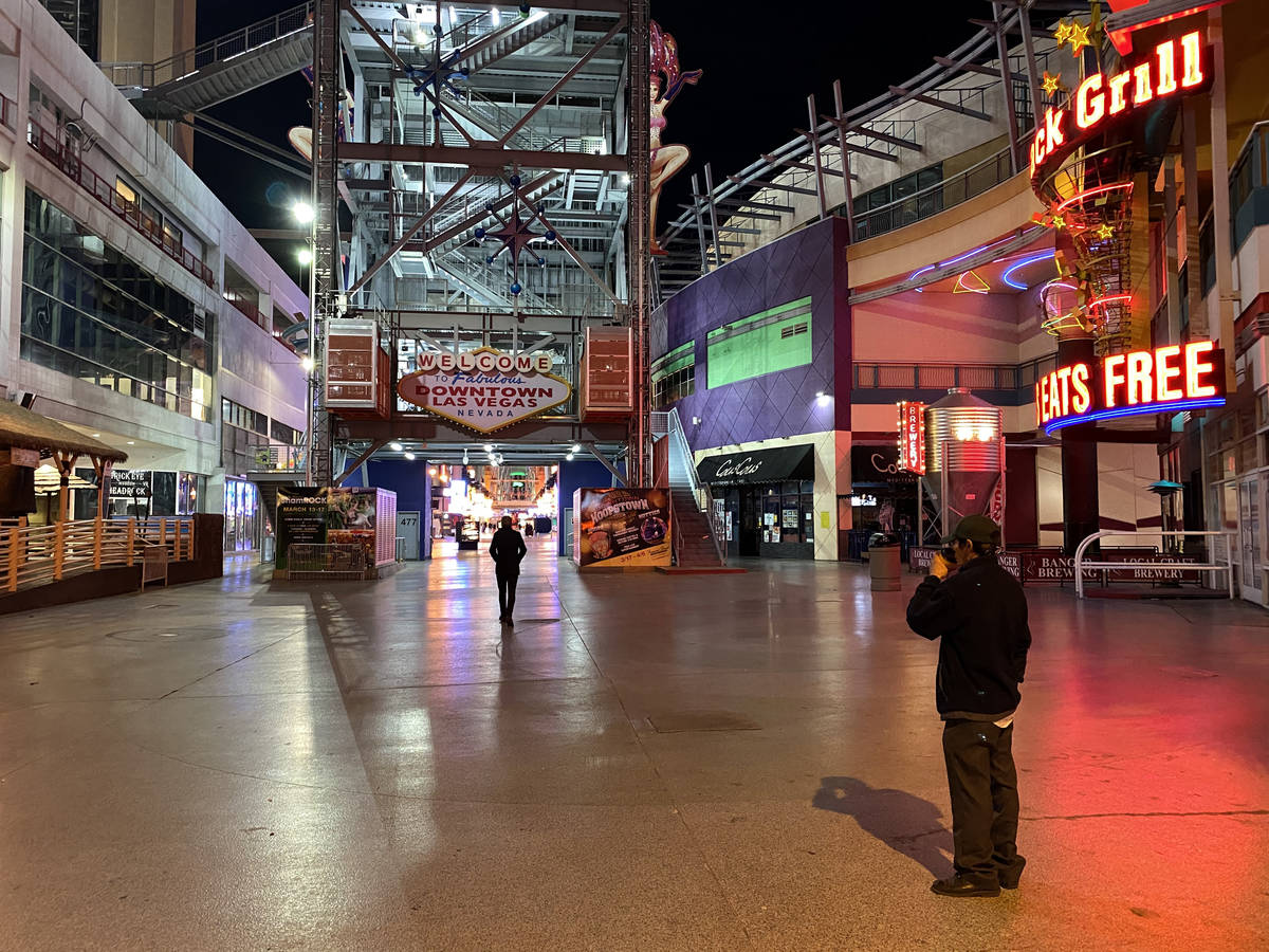 The welcome sign dark at Fremont Street Experience in downtown Las Vegas Wednesday, March 18, 2 ...