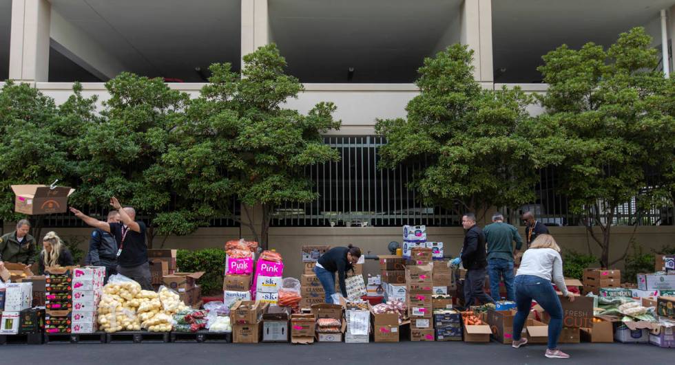 Food donated by MGM is up for grabs outside the Las Vegas Metropolitan Police Department headqu ...