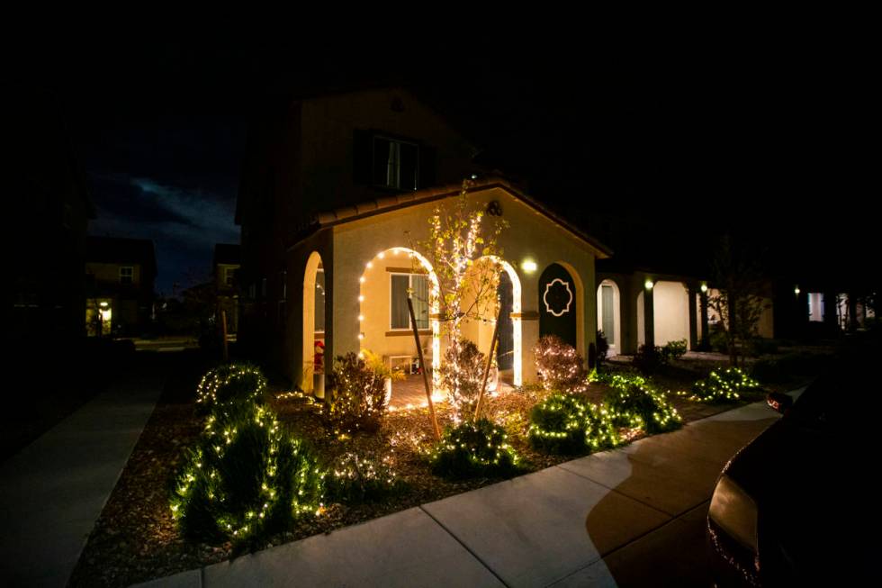 Lights at a home in the Inspirada community in Henderson on Thursday, March 26, 2020. (Chase St ...