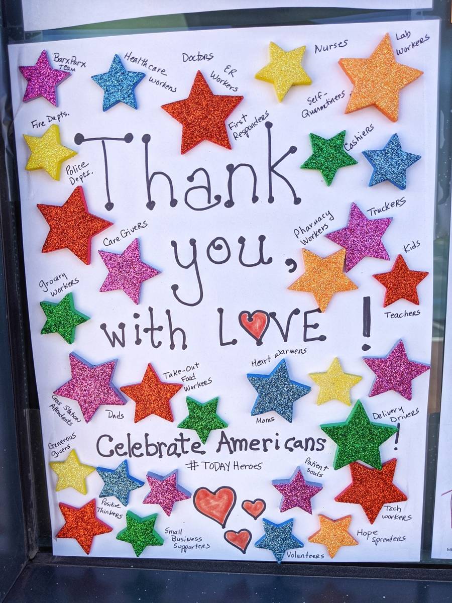 Messages of appreciation and support for first responders and others are displayed at Barx Parx ...