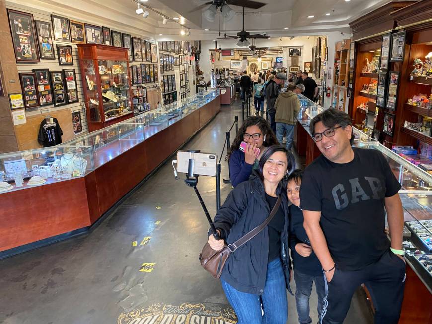 Salvador Enriquez takes a photo at noon Wednesday, March 18, 2020, with his wife, Nallely, daug ...