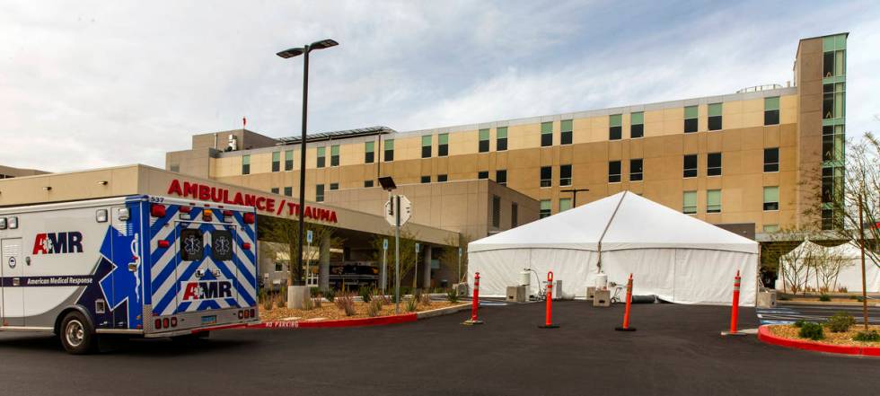 Sunrise Hospital and Medical Center has erected tents, currently empty, in their parking lot ne ...