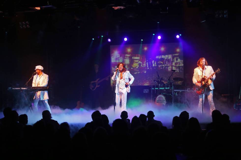 Wayne Hosking as Maurice Gibb, from left, David Scott as Robin Gibb, and Michael Clift as Barry ...