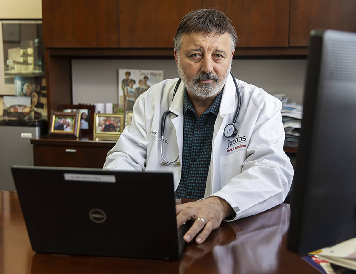 Primary care physician Dr. Loring Jacobs at his office in Henderson on Friday, March 20, 2020. ...