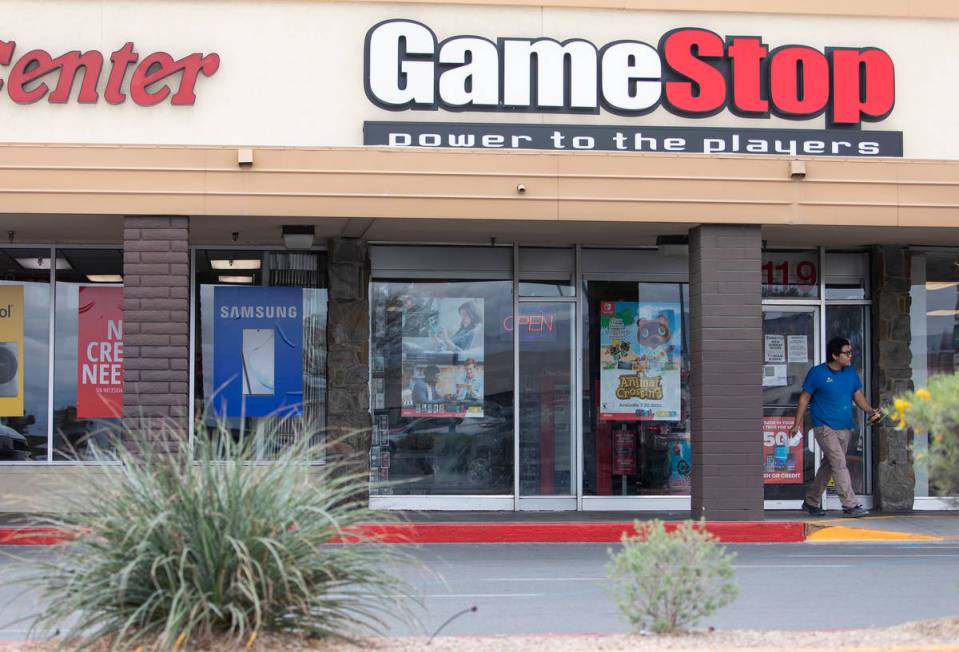 The GameStop store at 2119 East Lake Mead Boulevard remains open despite a call for nonessentia ...
