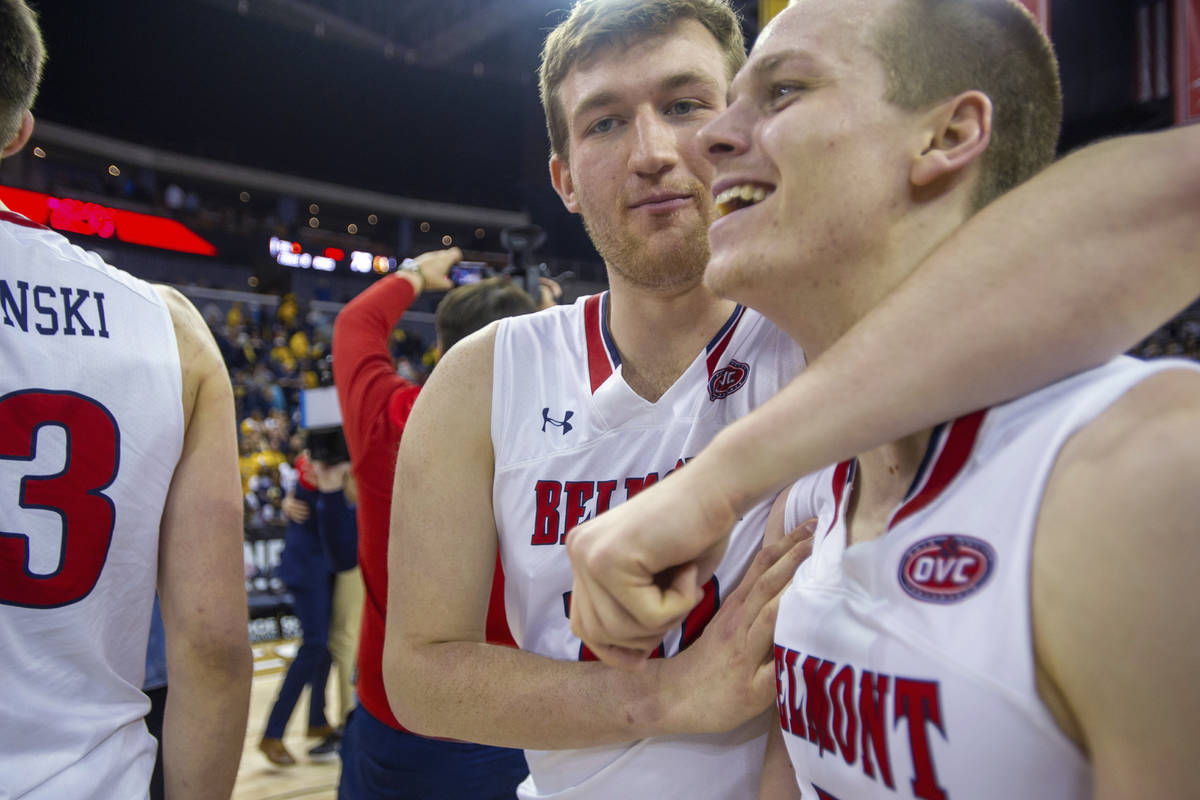 Belmont's Caleb Hollander (10) hugs Adam Kunkel (5) after the team's win over Murray State in a ...