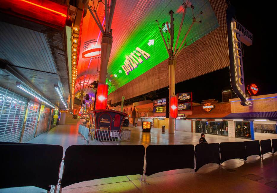 Gates block the entrance to the Fremont Street Experience in downtown Las Vegas, which is close ...