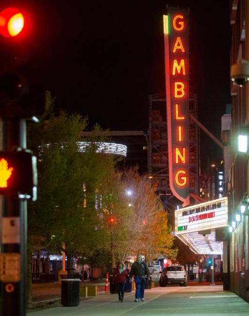 The streets of downtown Las Vegas are largely empty due to concerns related to the spread of th ...