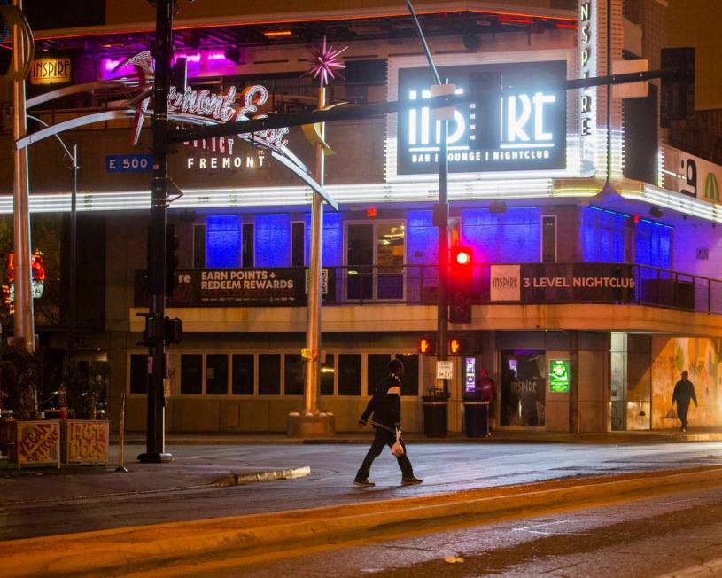 The streets of downtown Las Vegas are largely empty due to concerns related to the spread of th ...