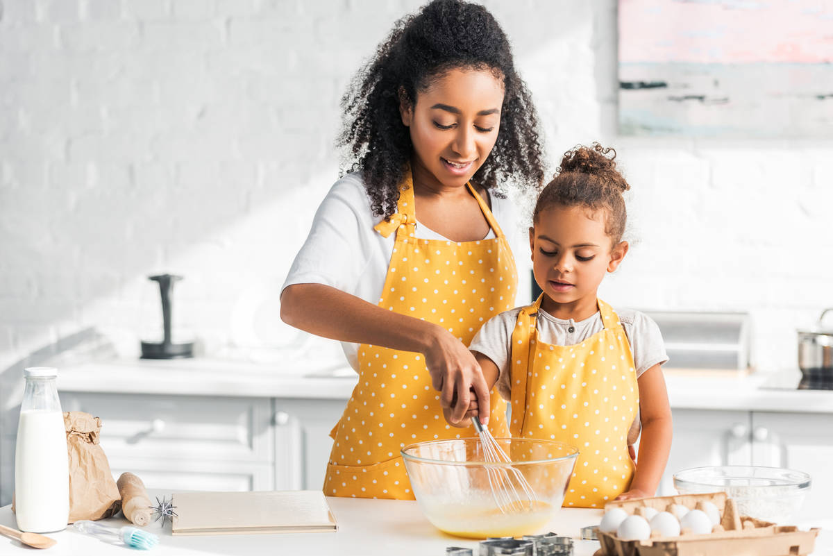 Families can cook together during this stay-at-home time. (Getty Images)