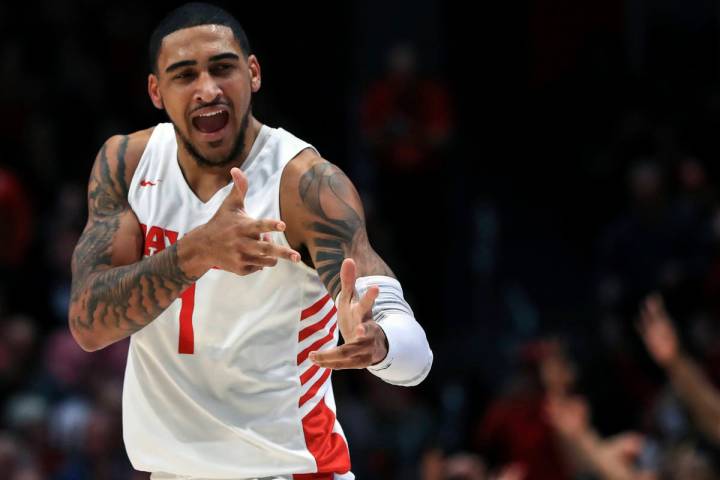 In this Feb. 11, 2020, file photo, Dayton's Obi Toppin (1) reacts in the first half in an NCAA ...