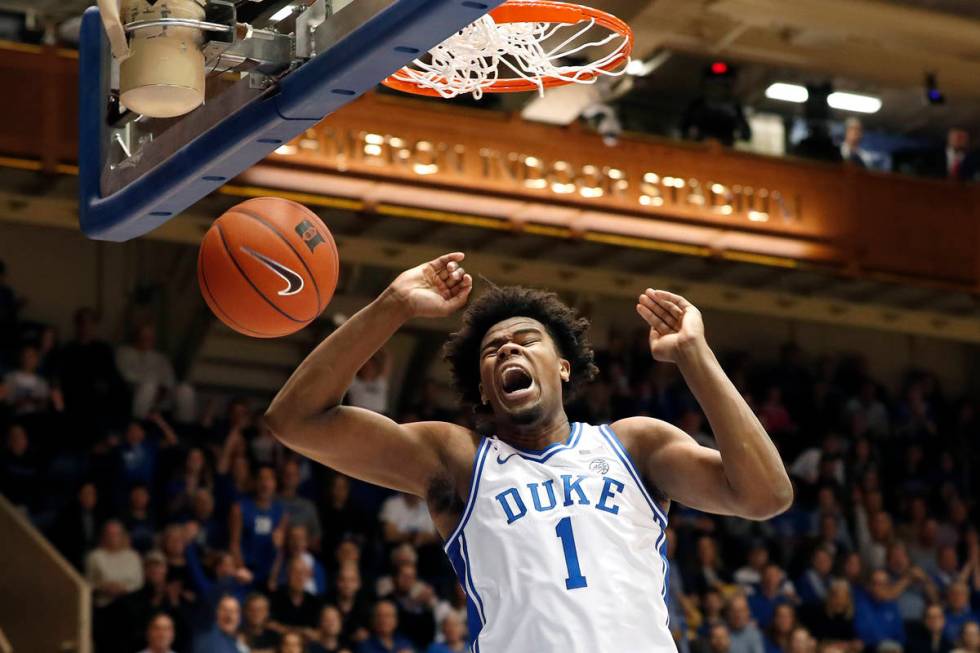 FILE - In this Dec. 31, 2019, file photo, Duke center Vernon Carey Jr. dunks against Boston Col ...