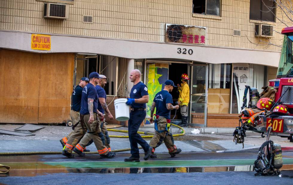 Las Vegas Fire Department personnel wraps up operations after a fire in a downtown Las Vegas va ...