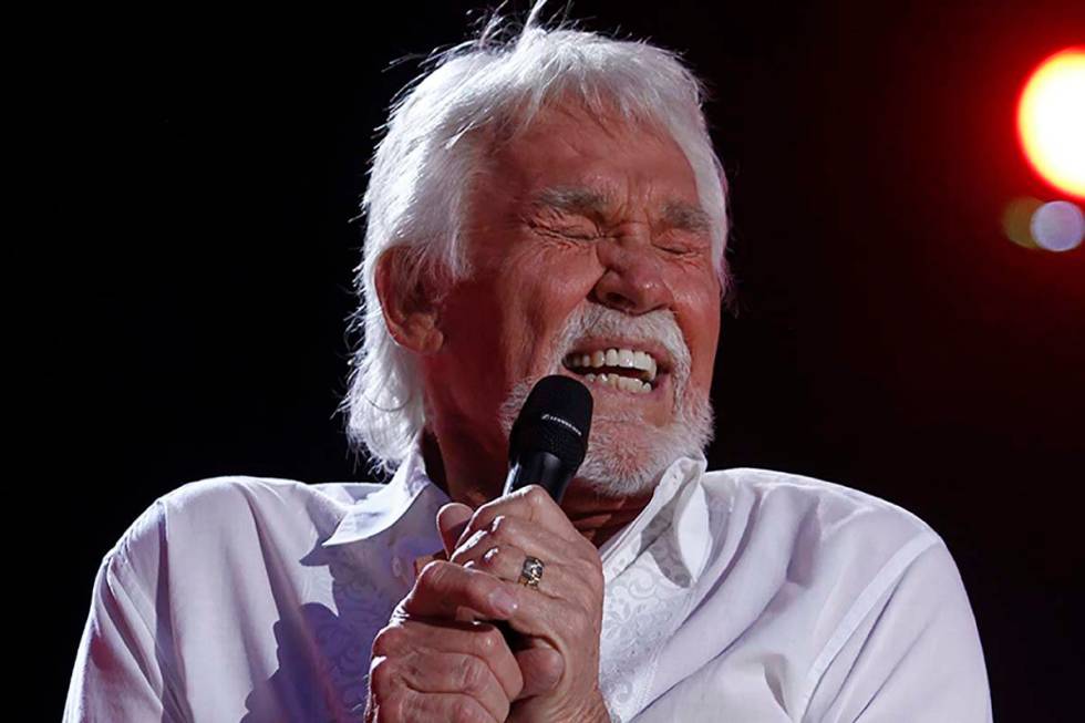 In this June 9, 2012, file photo, Kenny Rogers performs at the 2012 CMA Music Festival in Nashv ...