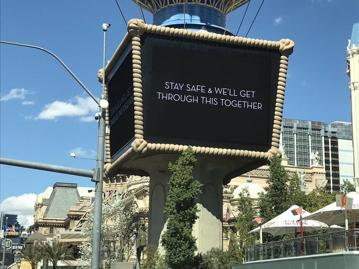 A message on the electronic marquee outside Planet Hollywood on Saturday, March 21, 2020, offer ...