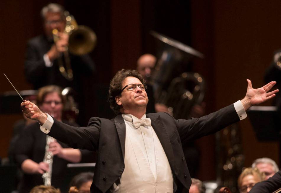 Music Director Donato Cabrera salutes the audience before the start of a performance by the Las ...