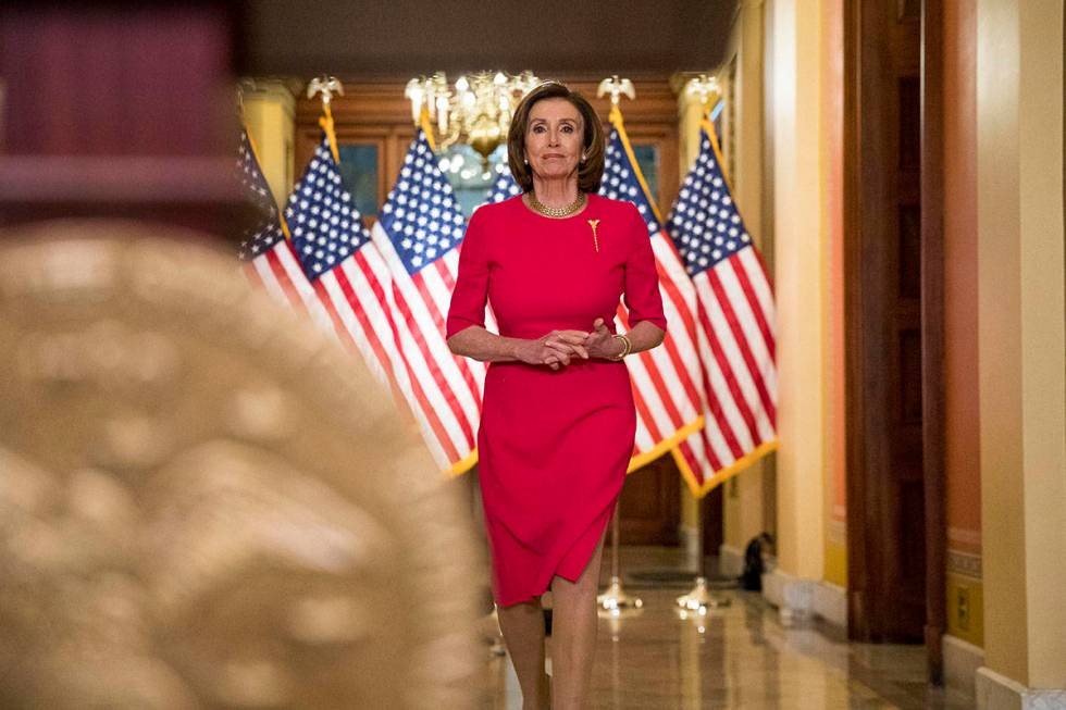 House Speaker Nancy Pelosi of Calif. arrives to read a statement outside her office on Capitol ...