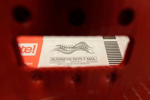 A box of ballots mailed in for the Washington state primary election are shown Tuesday, March 1 ...