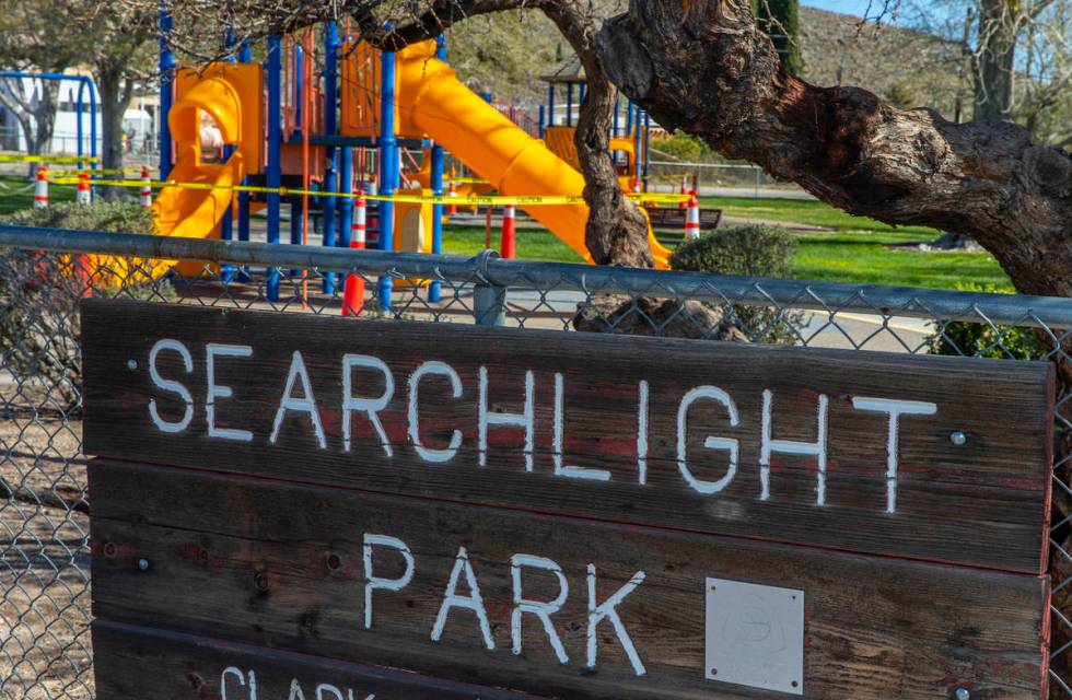 Searchlight Park is still open but the playground equipment closed off due to the coronavirus p ...
