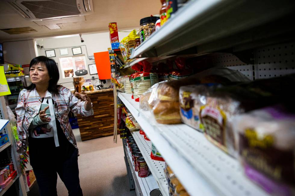 Sunny Martell, owner of Martell Market, shows the different items stocked at the market in Amar ...