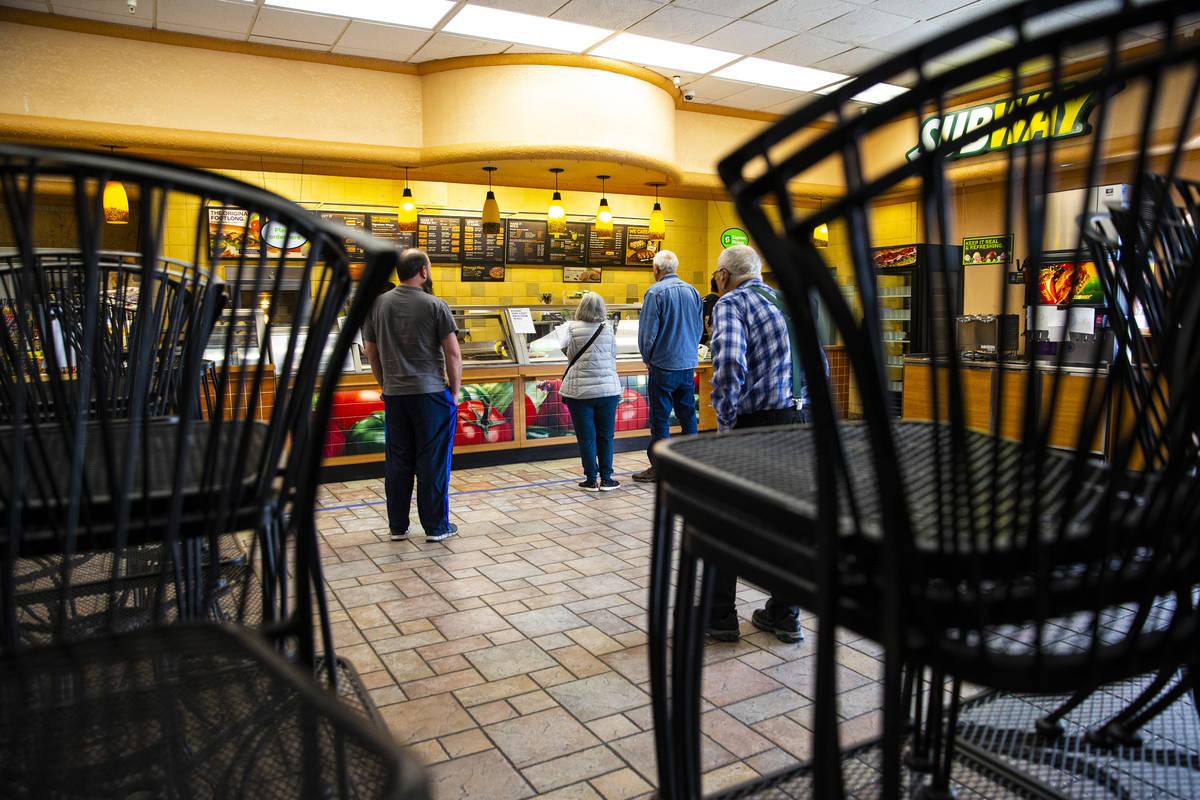 People line up a Subway in Death Valley Nut & Candy Co. in Beatty on Tuesday, March 24, 202 ...
