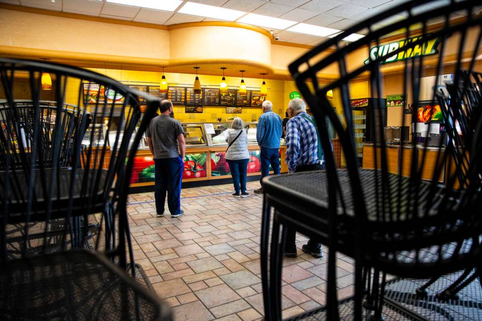 People line up a Subway in Death Valley Nut & Candy Co. in Beatty on Tuesday, March 24, 202 ...