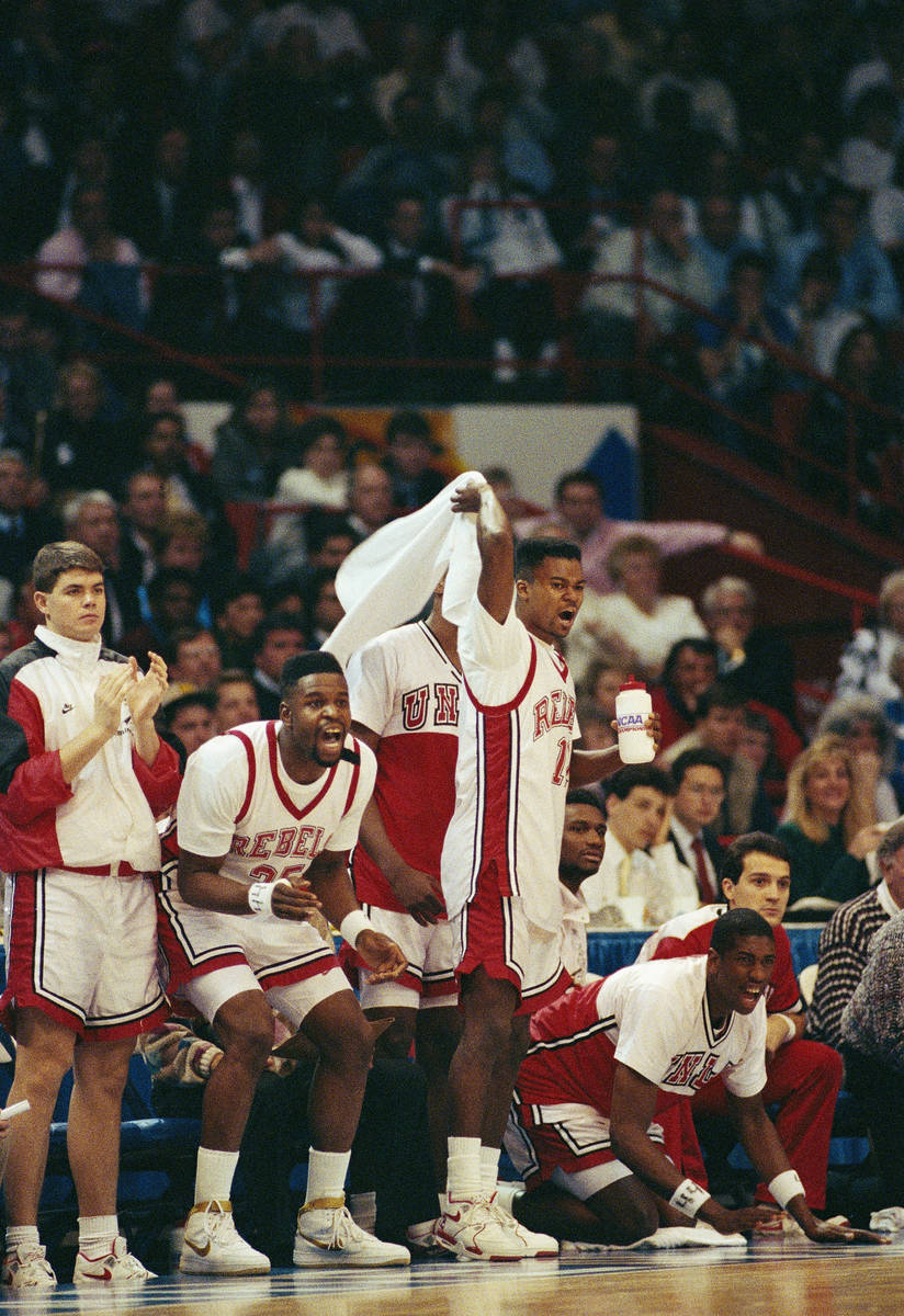 UNLV's Moses Sourry (left) and teammate Anderson Hunt celebrate their team's handling of the Du ...