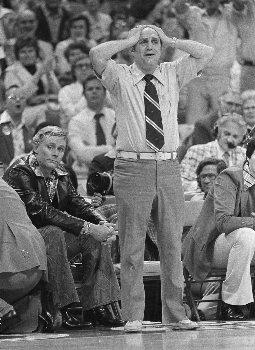 FILE - In this March 26, 1977, file photo, UNLV coach Jerry Tarkanian holds his head in final m ...