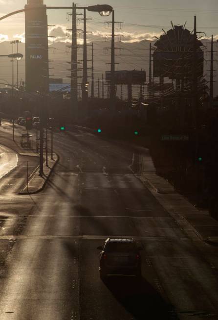 The sun sets on East Flamingo Road on the Strip on Tuesday, March 24, 2020, in Las Vegas. (Elle ...