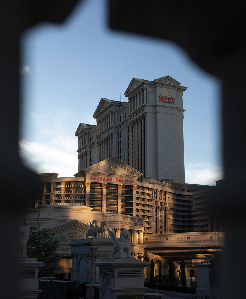 As the sun sets behind Caesar's Palace the light reflects off Flamingo and onto the resort on T ...
