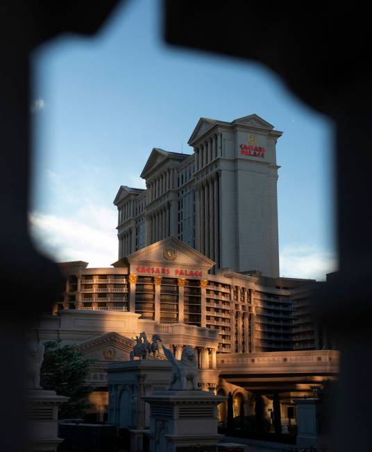 As the sun sets behind Caesar's Palace the light reflects off Flamingo and onto the resort on T ...