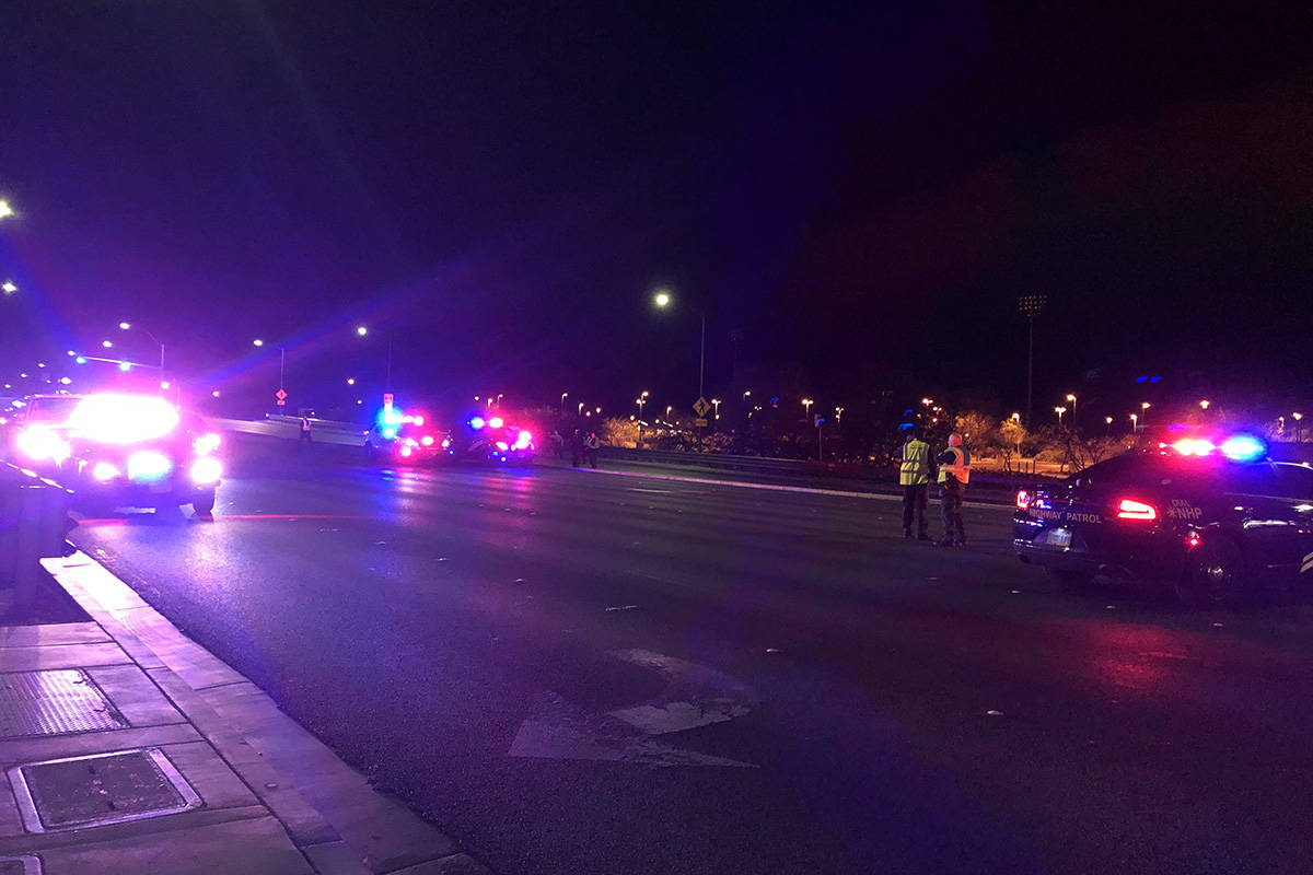 Police investigate a fatal crash involving a pedestrian Wednesday, March 25, 2020, near the int ...