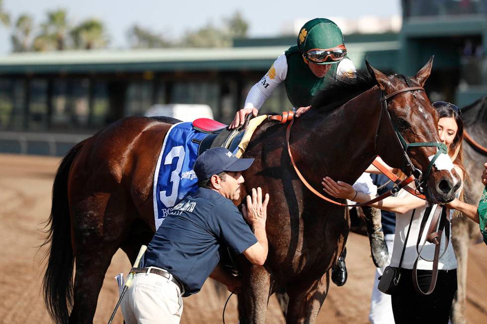 Jockey Javier Castellano dismounts Bolt d'Oro after the Santa Anita Derby horse race at Santa A ...