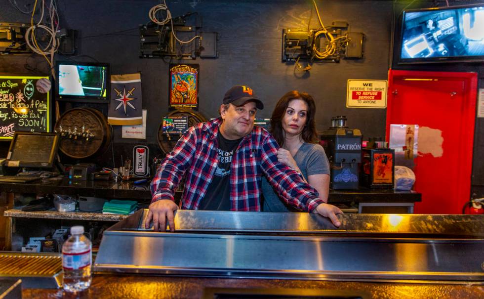 Saddle N Spurs Saloon owners Bobby and Melissa Kingston behind their bar as they close up for t ...