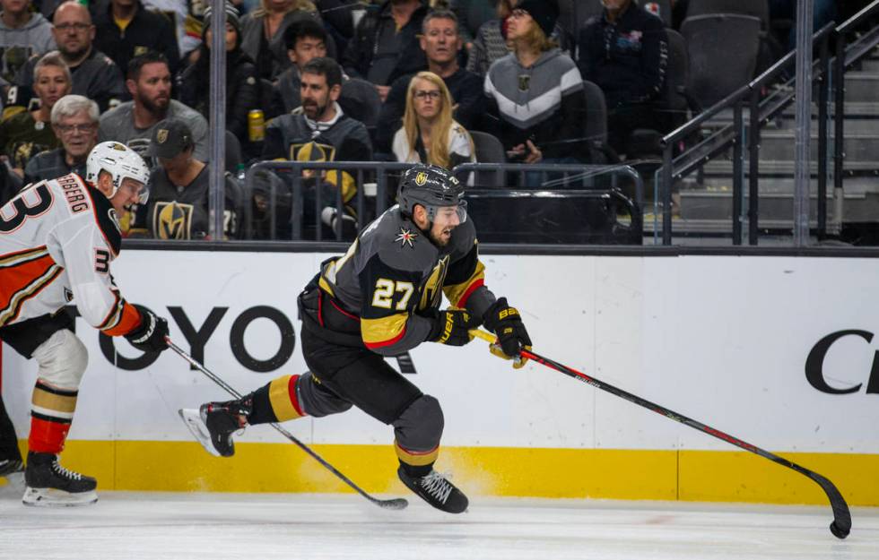 Anaheim Ducks right wing Jakob Silfverberg (33) trips up Vegas Golden Knights defenseman Shea T ...