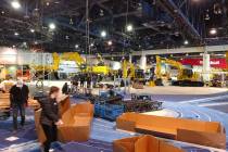 Contract trade show worker and Henderson resident Robert Reinecke worked building the Komatsu b ...