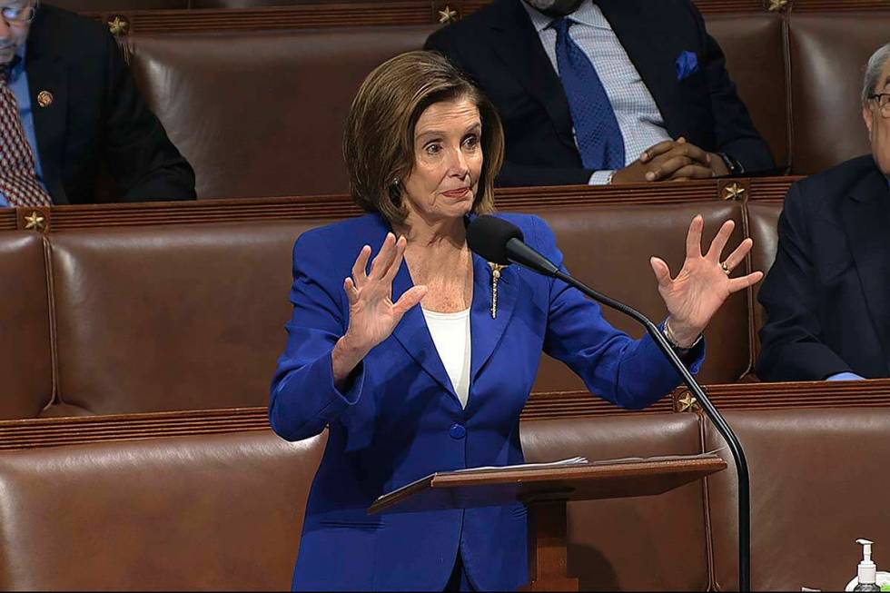 House Speaker Nancy Pelosi of Calif., speaks on the floor of the House of Representatives at th ...