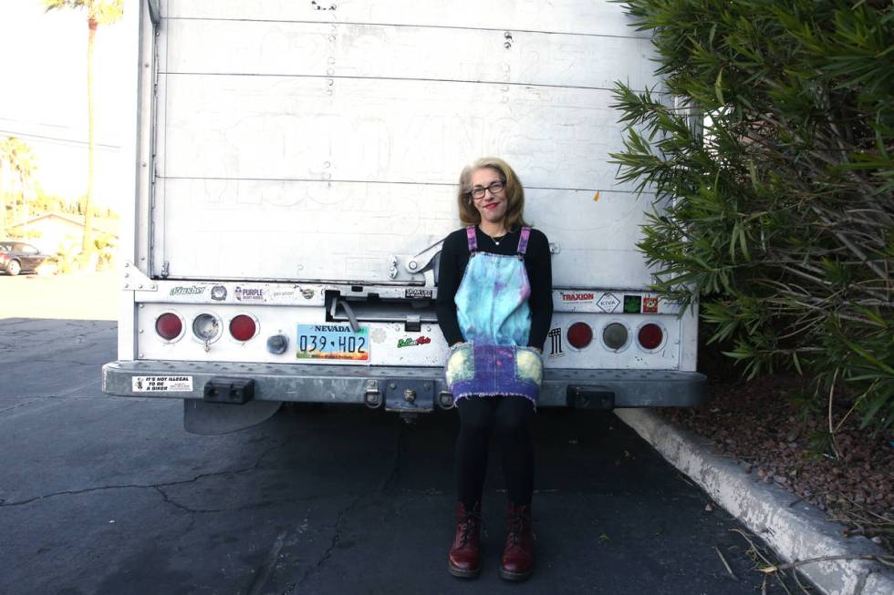 Emily-Kate Niskey, 52, with her 1994 converted U-Haul truck where she lives with her husband in ...